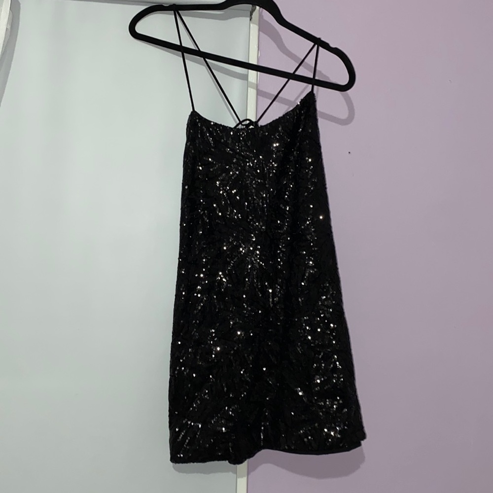 Black mini dress open back from cosmopolitan BRAND NEW FITS LIKE A M